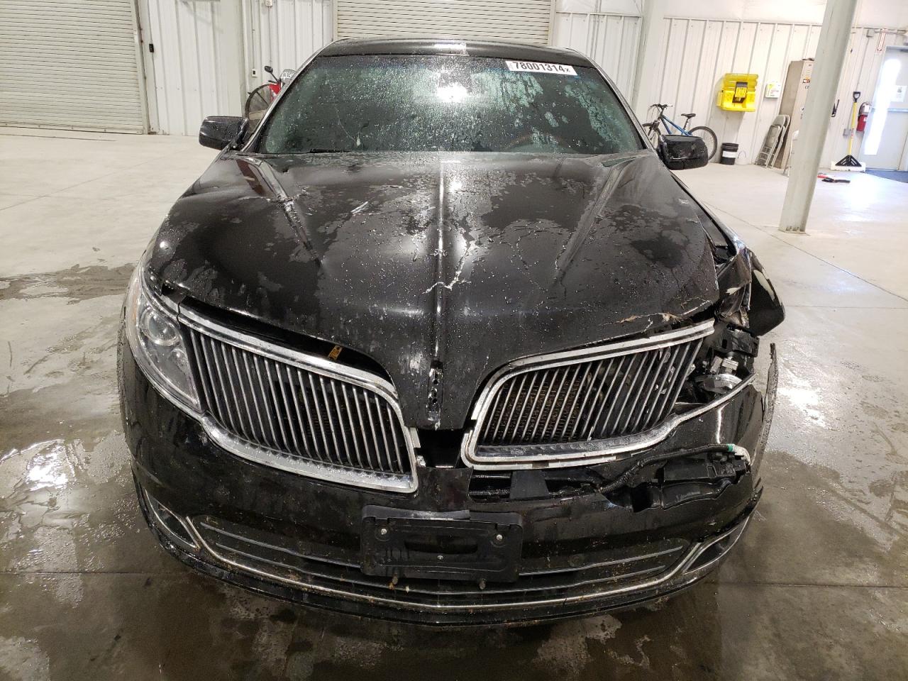 2014 Lincoln MKS VIN 1LNHL9FT9EG601160 Copart auction photo, front end / side damage thumbnail 5