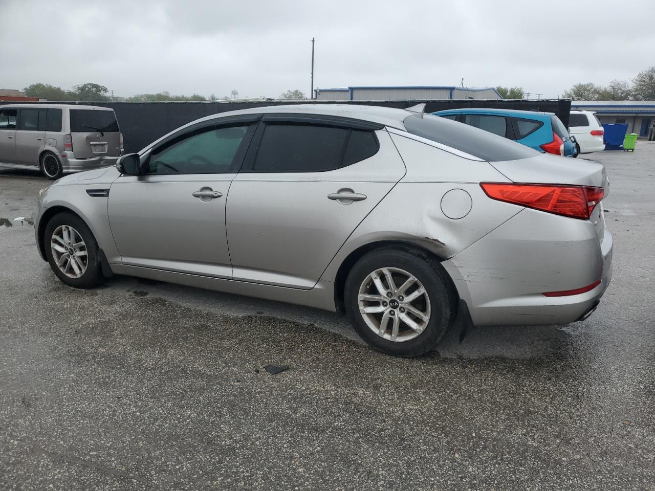 2011 KIA Optima VIN KNAGM4A7XB5163585 Copart auction photo, rear end / minor dent/scratches damage thumbnail 2