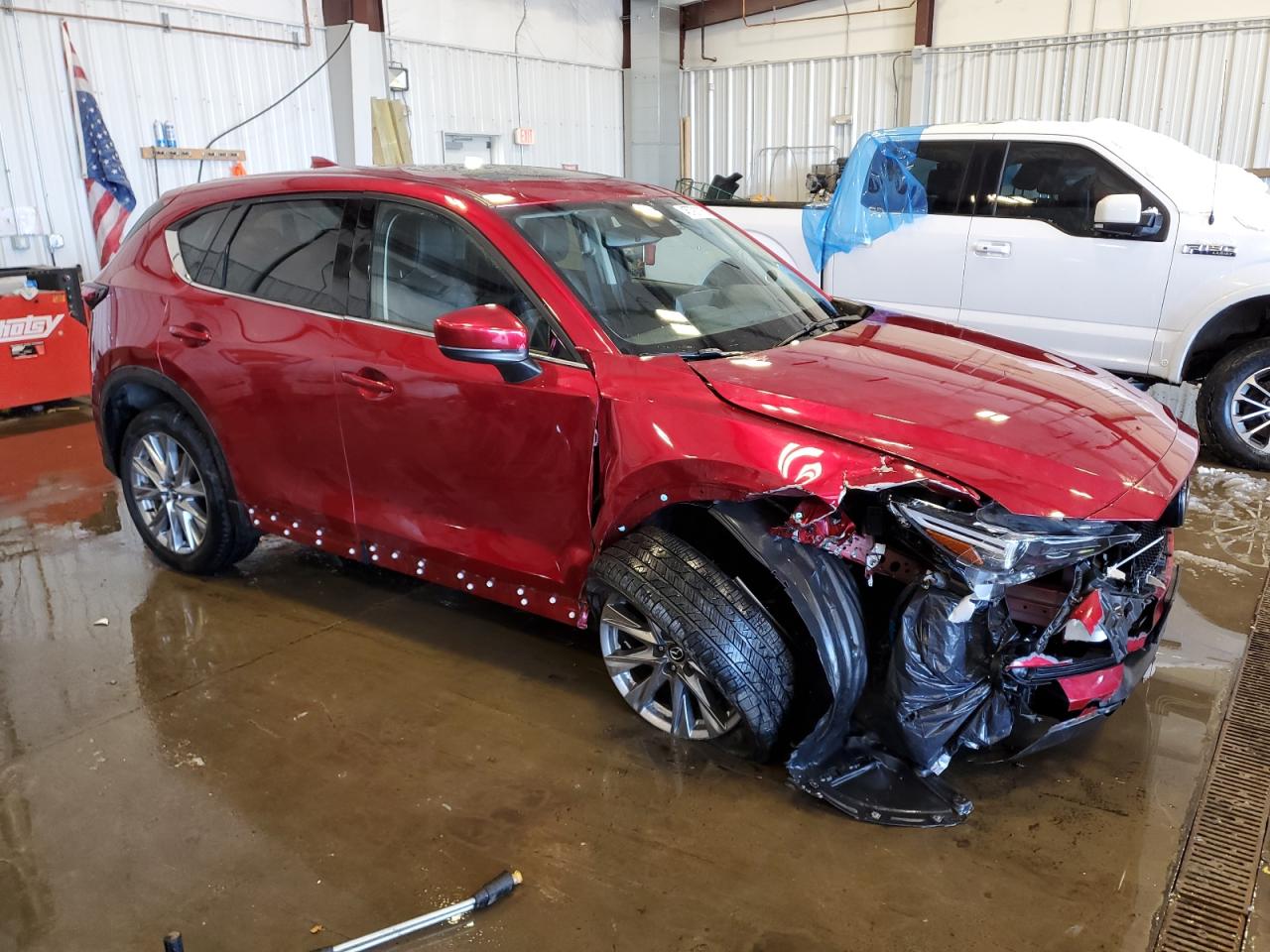 2021 Mazda CX-5 VIN JM3KFBDM2M1398206 Copart auction photo, front end damage thumbnail 4