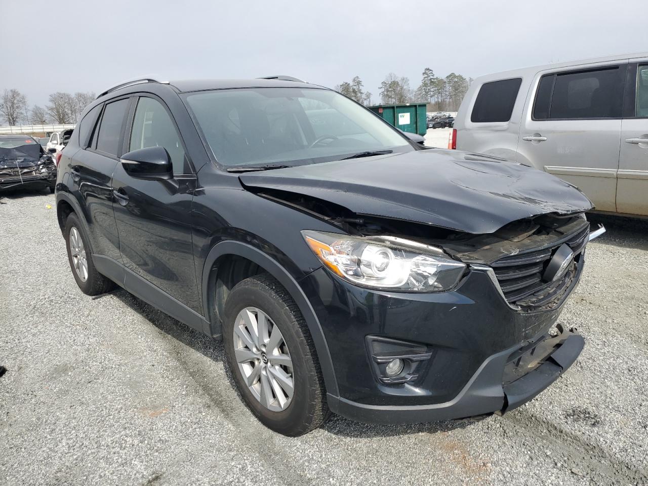 2016 Mazda CX-5 VIN JM3KE2CY1G0654434 Copart auction photo, front end damage thumbnail 4