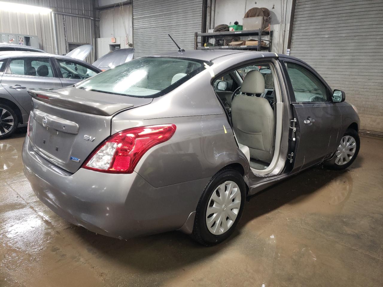 2013 Nissan Versa VIN 3N1CN7AP7DL852912 Copart auction photo, side / rear end damage thumbnail 3