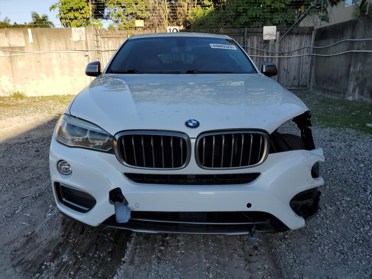 2016 BMW X6 VIN 5UXKU2C50G0N84165 Copart auction photo, side / front end damage thumbnail 5