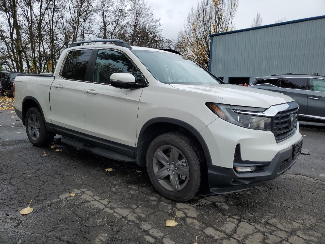 2023 Honda Ridgeline VIN 5FPYK3F51PB068148 Copart auction photo, front end / side damage thumbnail 4