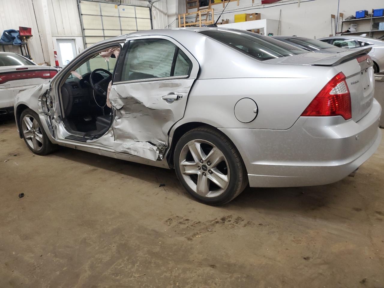 2012 Ford Fusion VIN 3FAHP0KCXCR411759 Copart auction photo, side / front end damage thumbnail 2