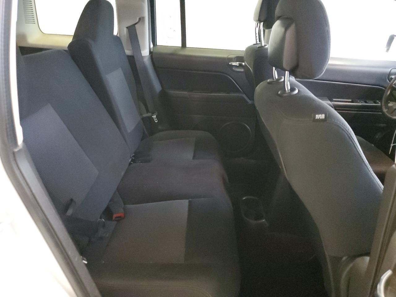 2014 Jeep Liberty (Patriot) VIN 1C4NJRFB5ED659675 Copart auction photo, rear end / minor dent/scratches damage thumbnail 11