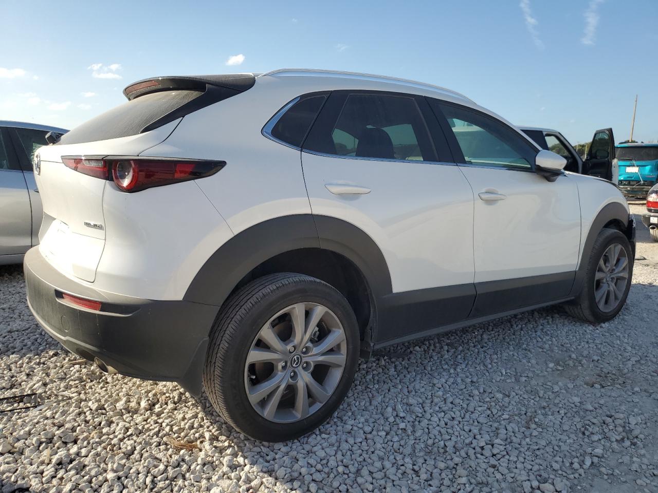 2023 Mazda CX-30 VIN 3MVDMBCM5PM537212 Copart auction photo, front end / minor dent/scratches damage thumbnail 3