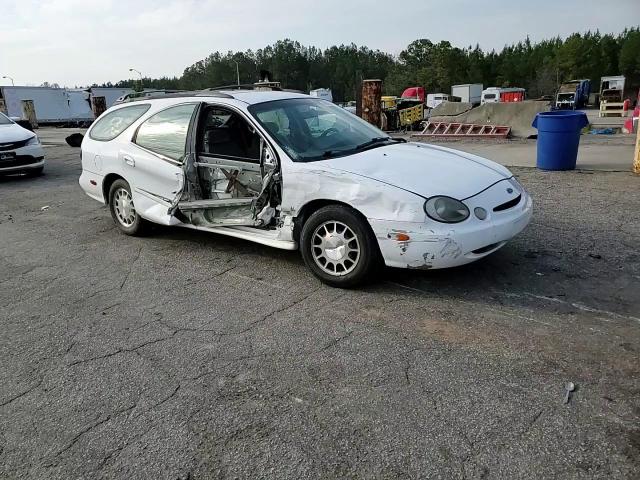 1999 Ford Taurus VIN 1FAFP58S0XA272714 Copart auction photo, side / front end damage thumbnail 11