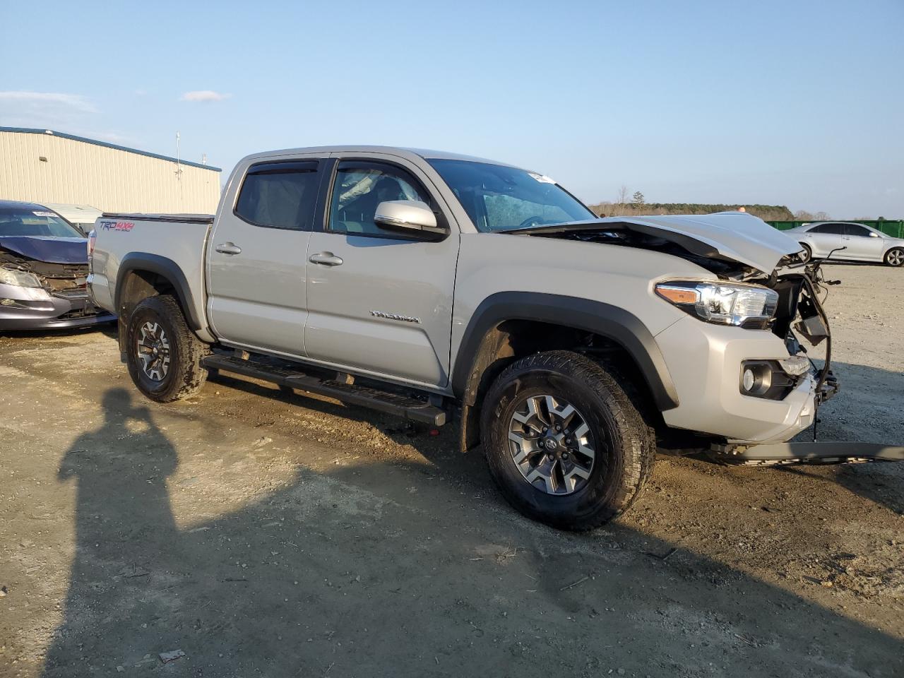 2021 Toyota Tacoma VIN 3TYCZ5ANXMT011945 Copart auction photo, front end damage thumbnail 4