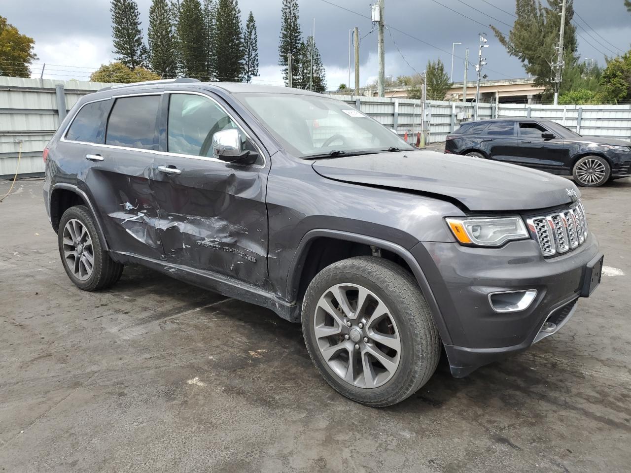 2017 Jeep Grand Cherokee VIN 1C4RJFCG4HC927741 Copart auction photo, side damage thumbnail 4