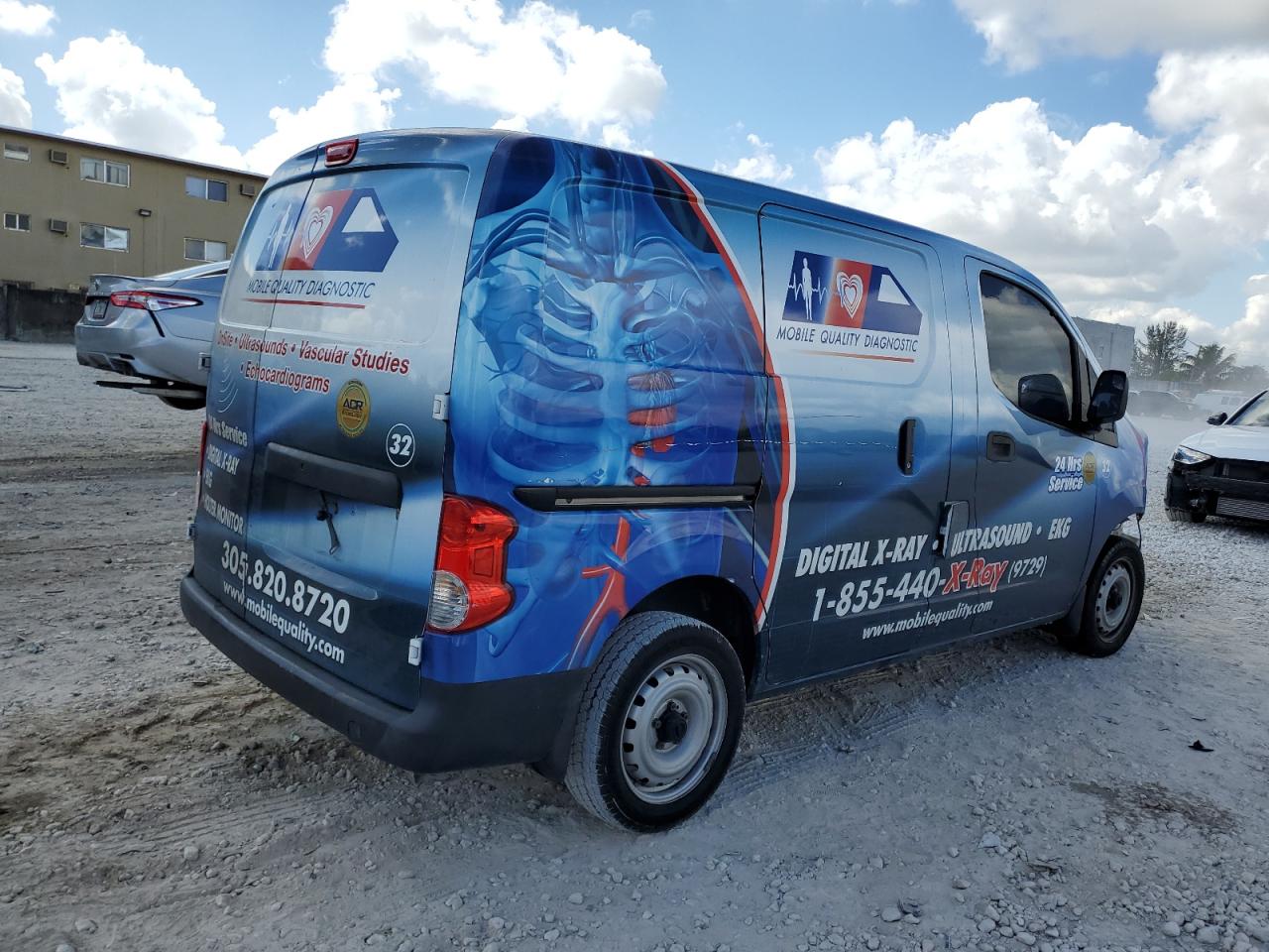 2015 Nissan NV VIN 3N6CM0KN4FK734133 Copart auction photo, front end / minor dent/scratches damage thumbnail 3