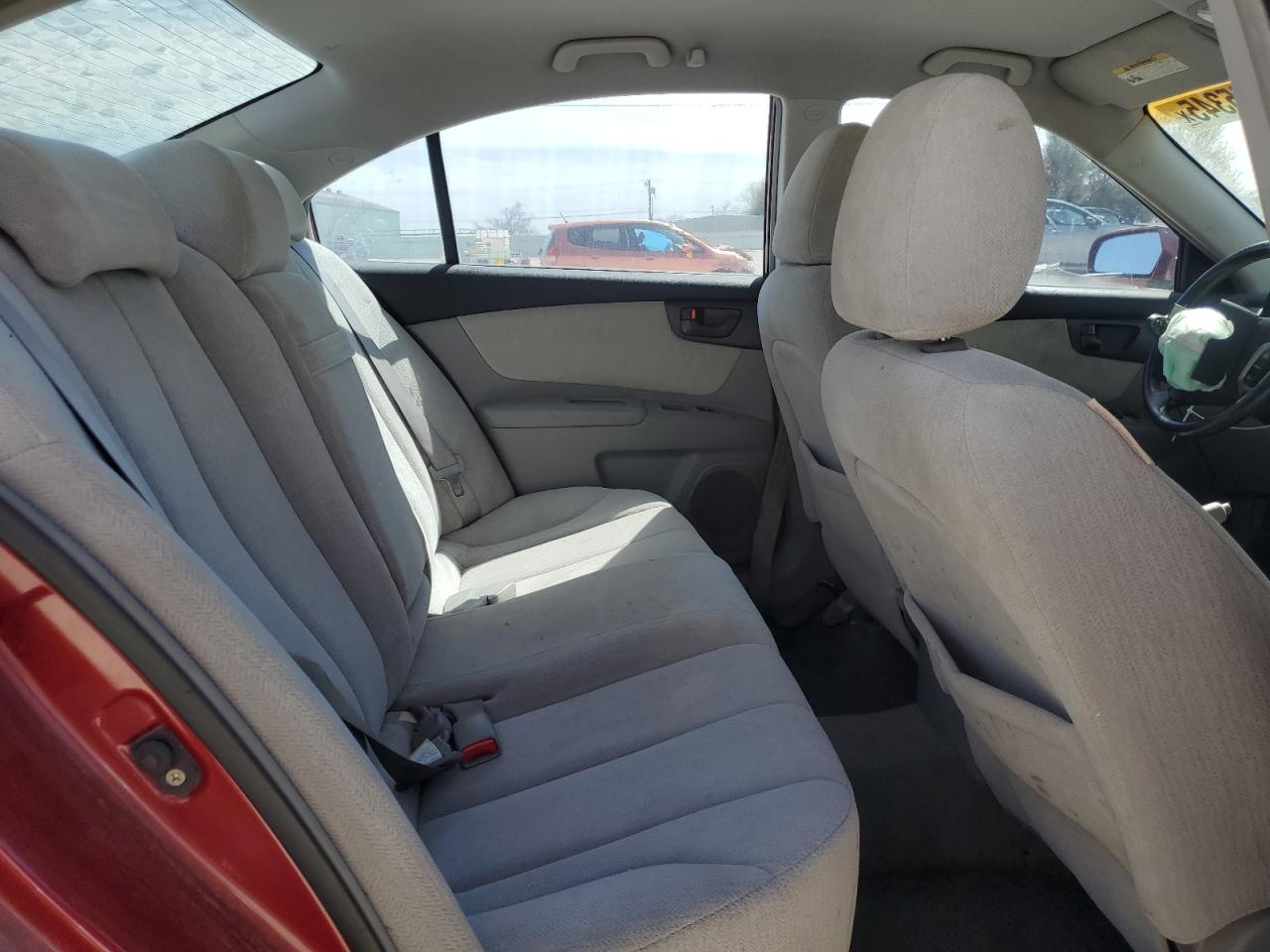 2006 KIA Optima VIN KNAGE123365056357 Copart auction photo, front end / minor dent/scratches damage thumbnail 10