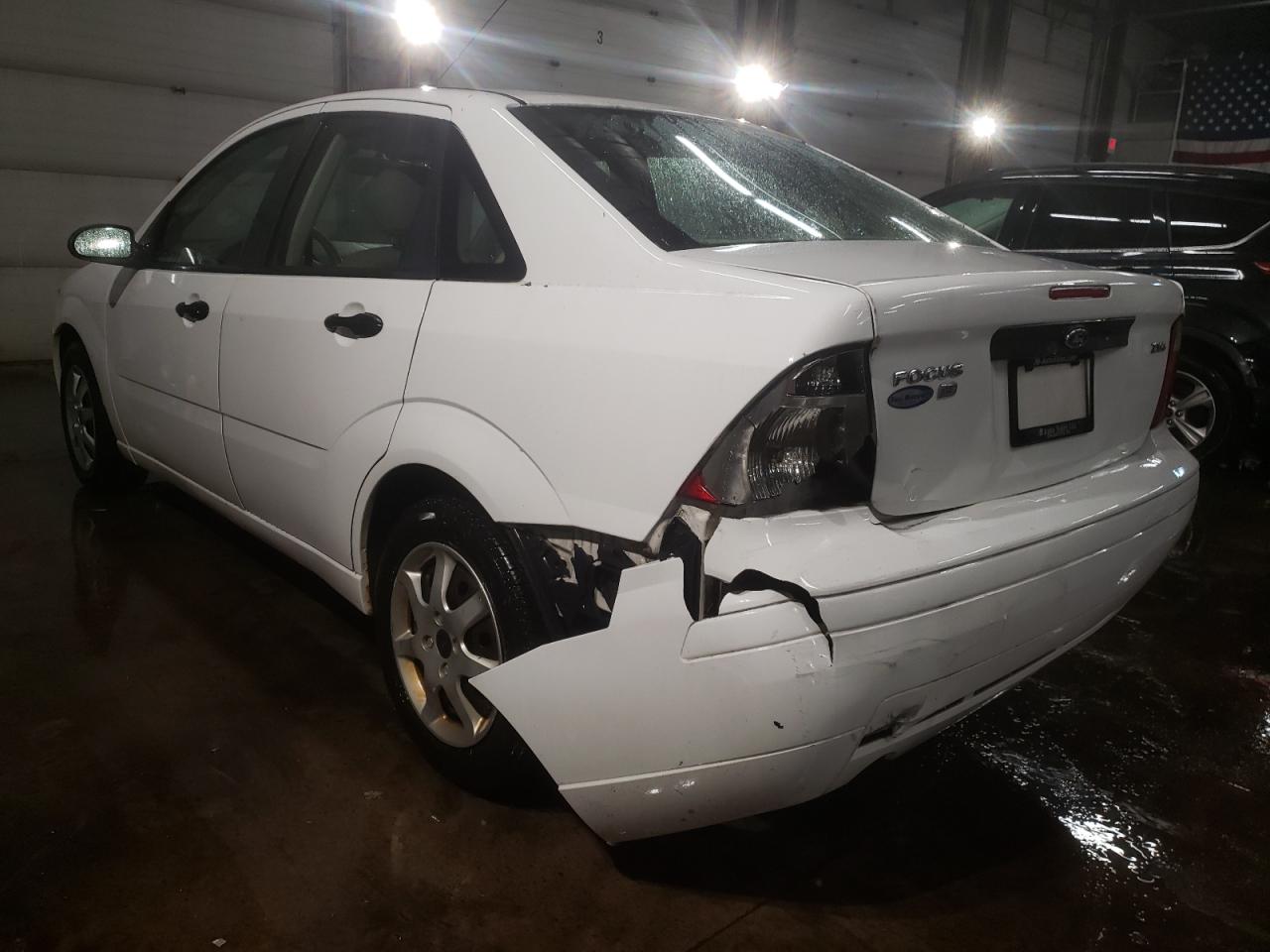 2005 Ford Focus VIN 1FAFP34N65W187123 Copart auction photo, rear end / minor dent/scratches damage thumbnail 2