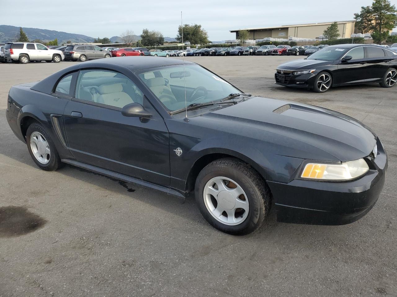 1999 Ford Mustang VIN 1FAFP4044XF218987 Copart auction photo, minor dent/scratches damage thumbnail 4