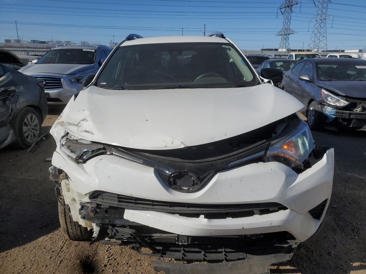 2018 Toyota RAV 4 VIN JTMZFREV9JD122722 Copart auction photo, front end damage thumbnail 5