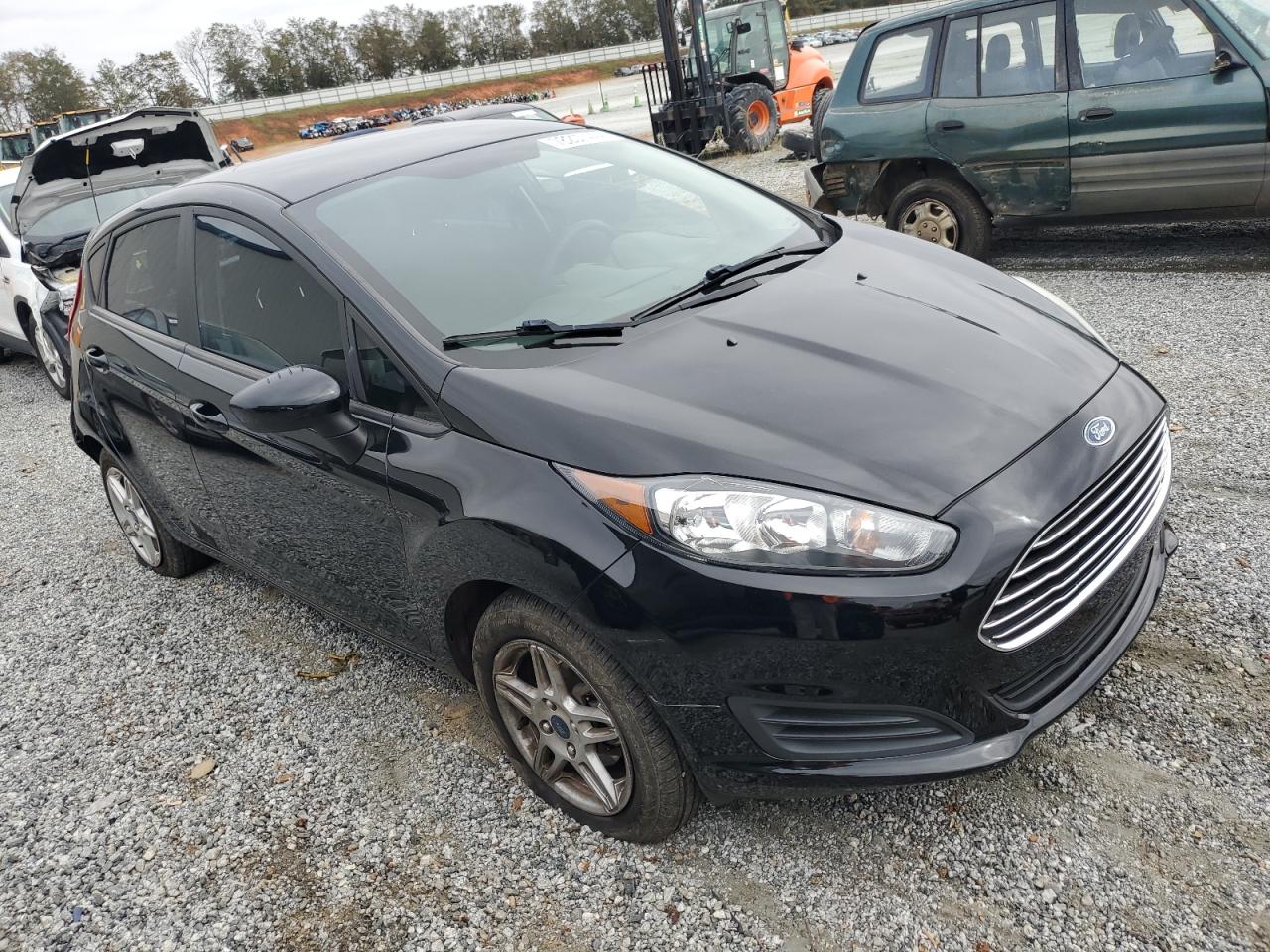 2019 Ford Fiesta VIN 3FADP4EJ0KM154221 Copart auction photo, rear end damage thumbnail 4