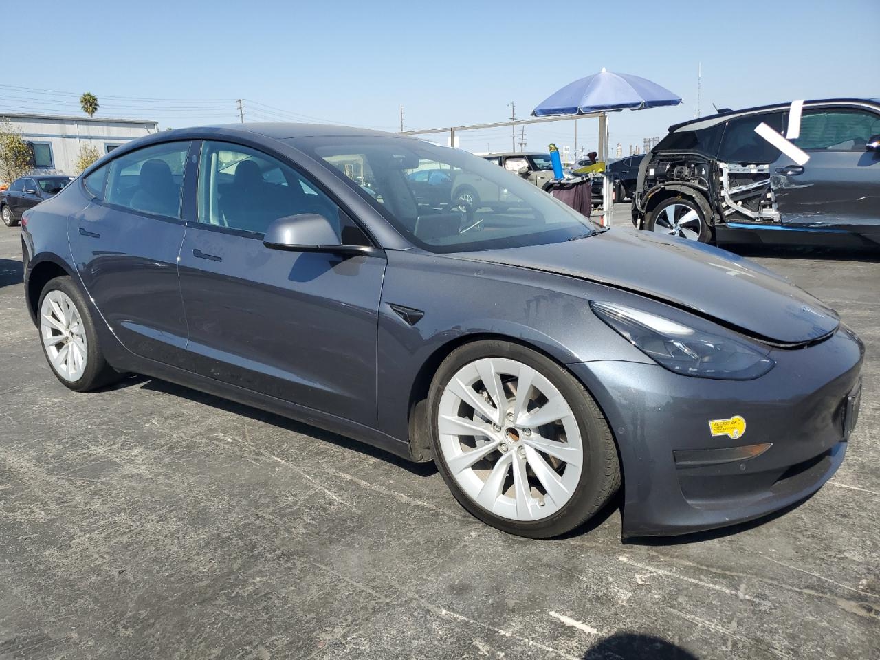 2022 Tesla Model 3 VIN 5YJ3E1EA1NF372879 Copart auction photo, front end / undercarriage damage thumbnail 4