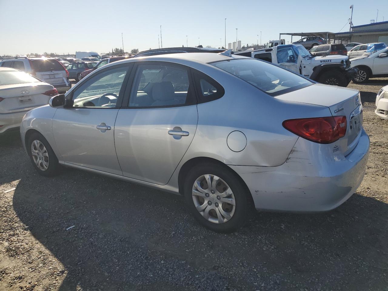 2010 Hyundai Elantra VIN KMHDU4AD6AU013517 Copart auction photo, side / rear end damage thumbnail 2