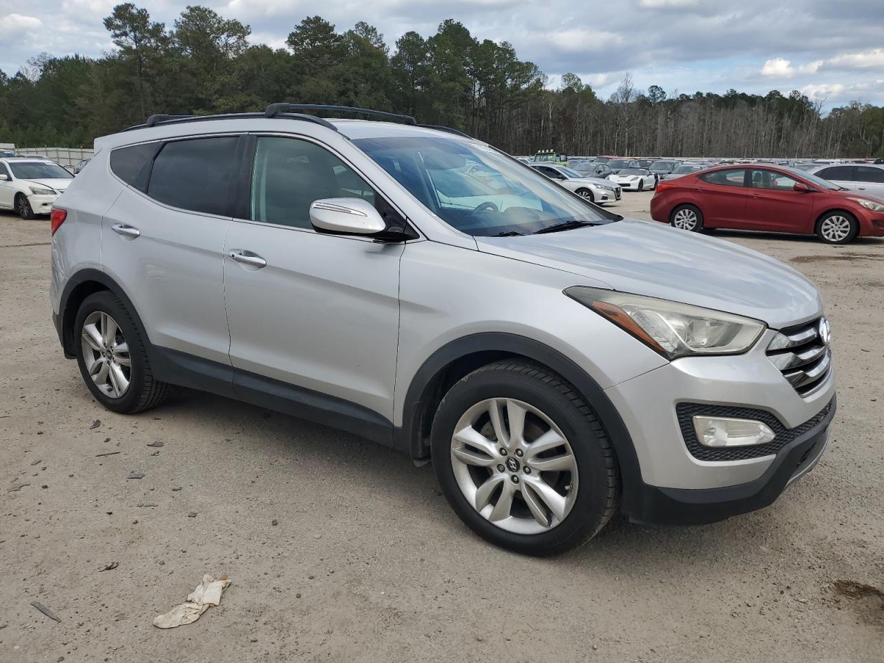 2014 Hyundai Santa Fe VIN 5XYZU3LA9EG173924 Copart auction photo, undercarriage damage thumbnail 4