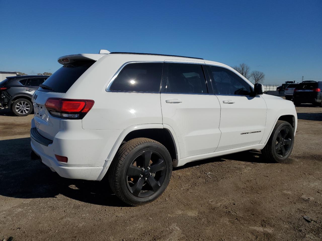 2015 Jeep Grand Cherokee VIN 1C4RJFAG1FC918365 Copart auction photo, vandalism damage thumbnail 3