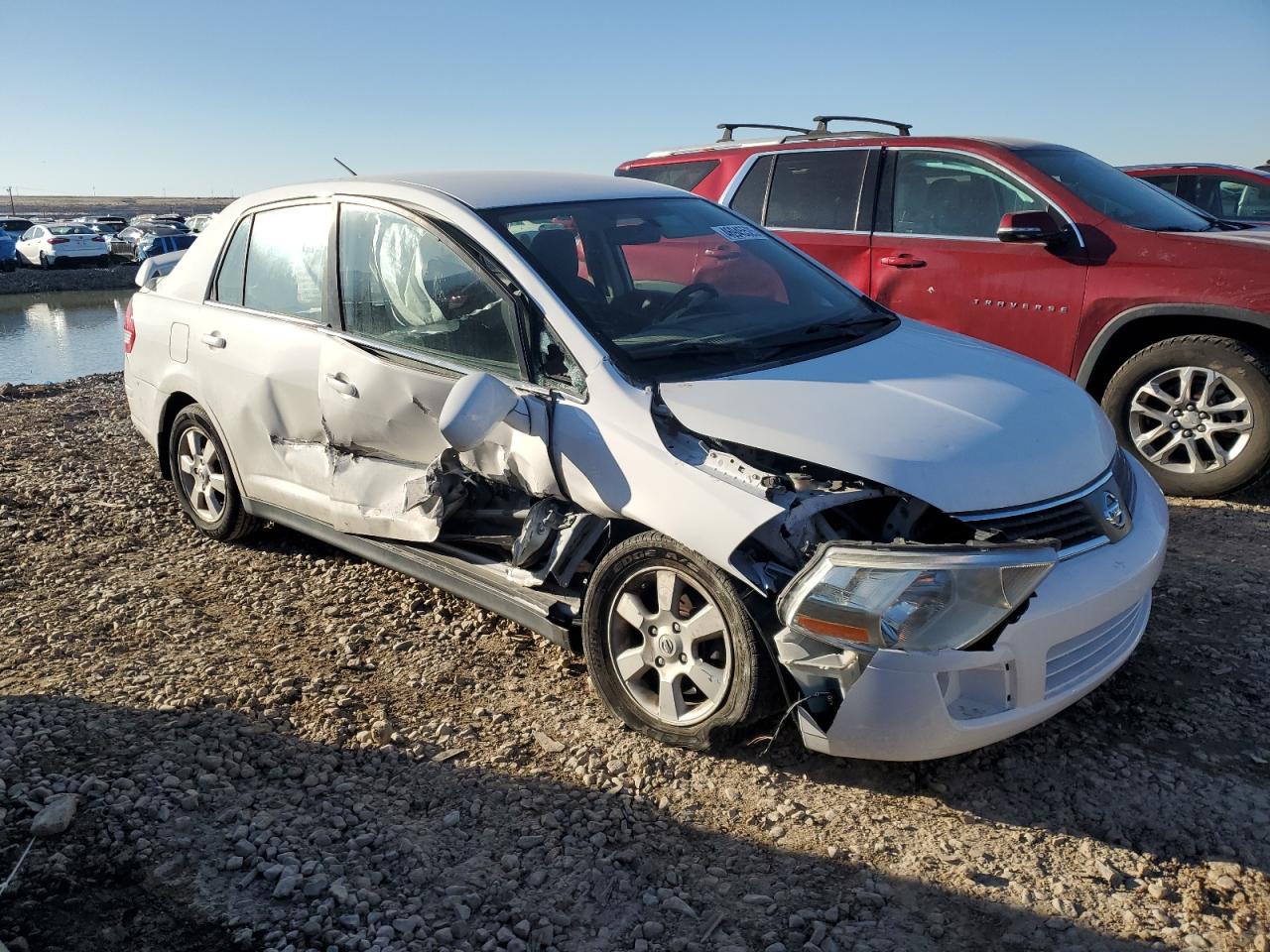 2007 Nissan Versa VIN 3N1BC11E57L414097 Copart auction photo, side / front end damage thumbnail 4