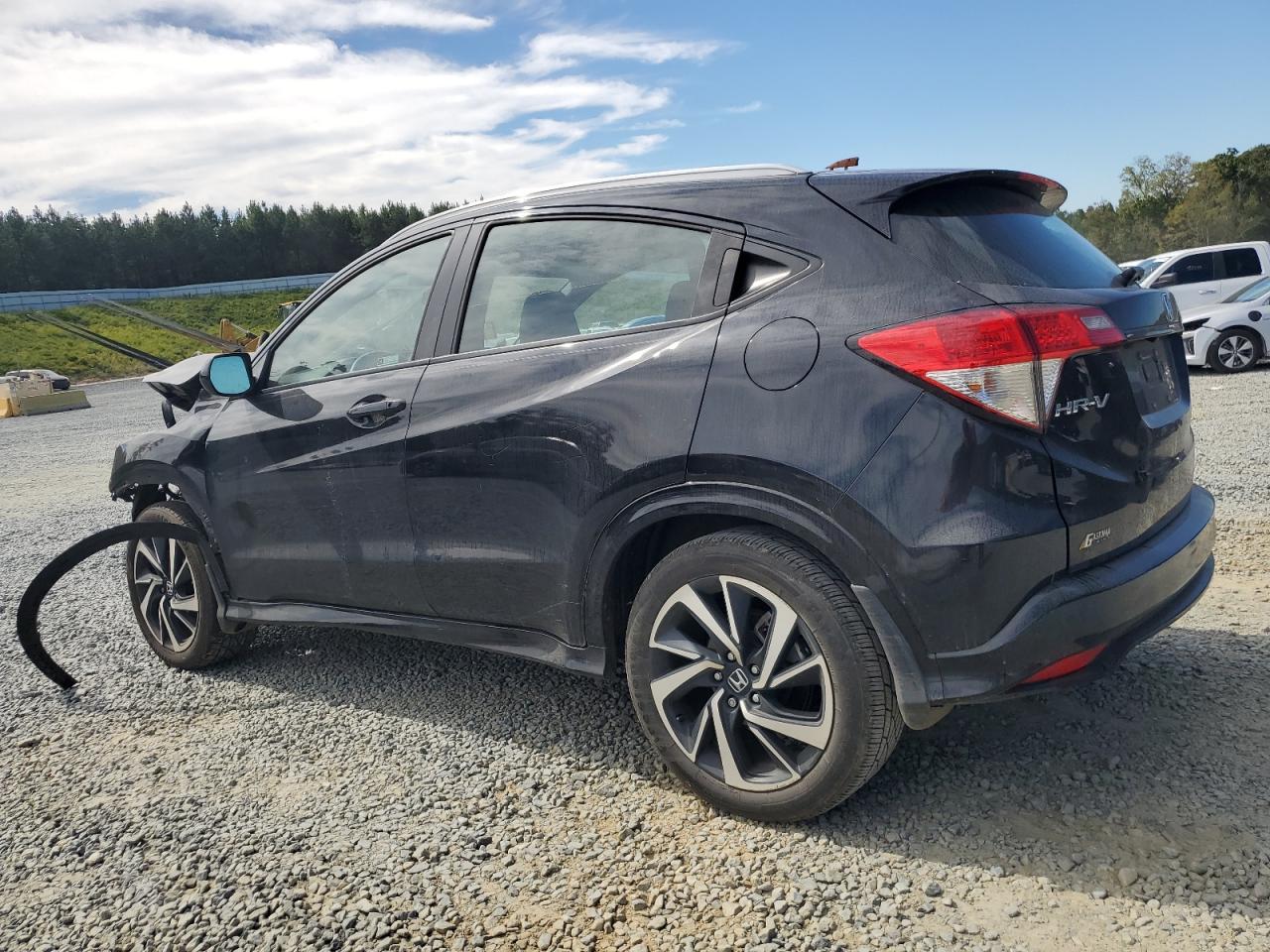 2019 Honda HR-V VIN 3CZRU5H10KM720401 Copart auction photo, front end / side damage thumbnail 2