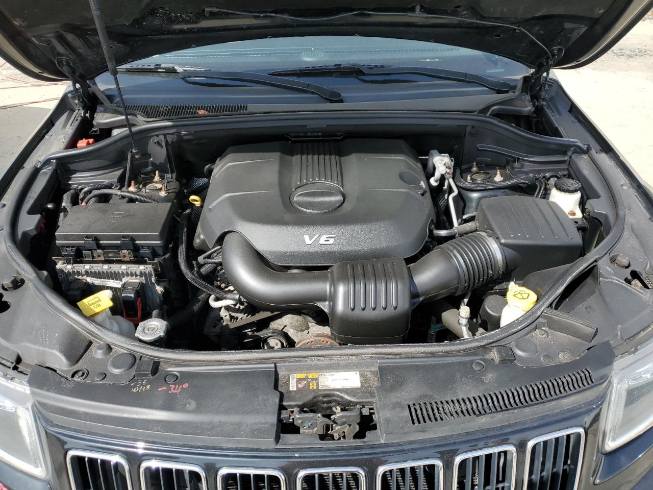 2015 Jeep Grand Cherokee VIN 1C4RJFBG2FC851841 Copart auction photo, undercarriage / side damage thumbnail 12