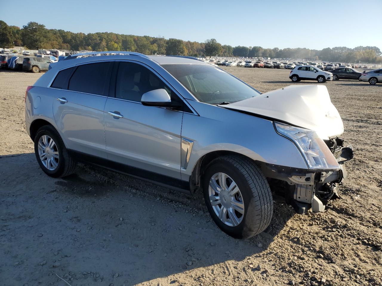 2015 Cadillac SRX VIN 3GYFNBE39FS590883 Copart auction photo, front end / minor dent/scratches damage thumbnail 4