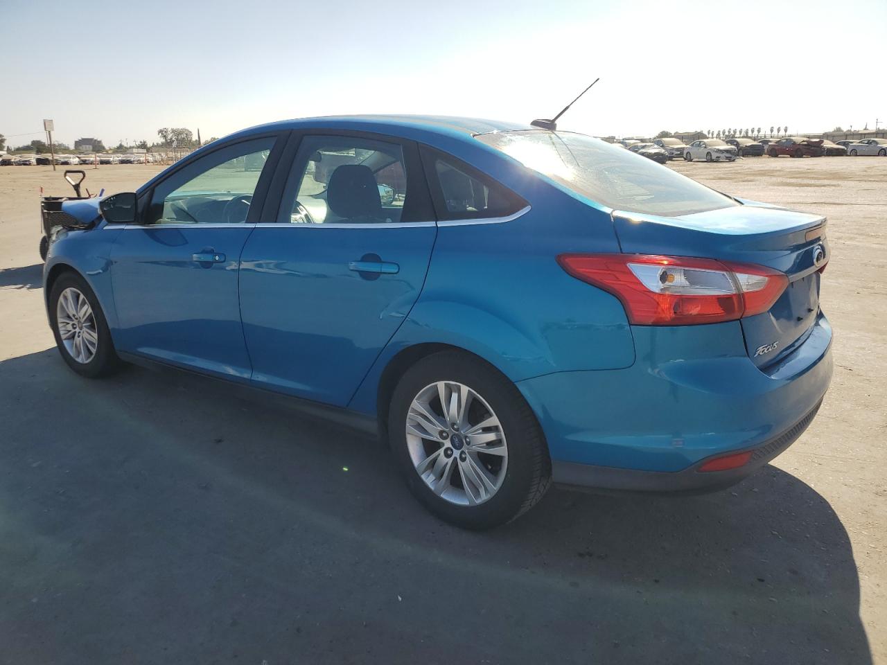 2012 Ford Focus VIN 1FAHP3H23CL437909 Copart auction photo, front end damage thumbnail 2