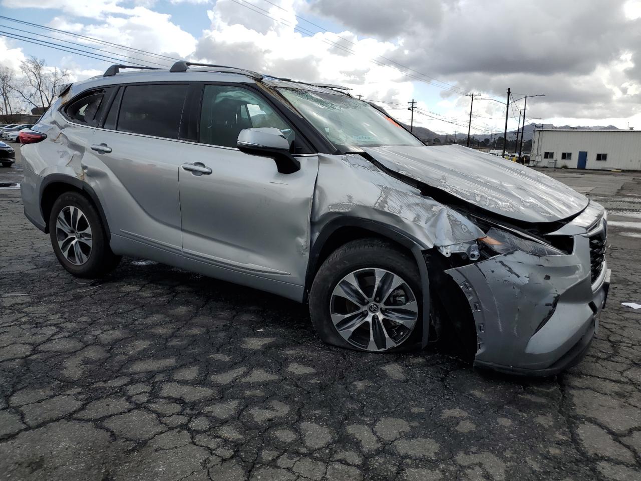 2022 Toyota Highlander VIN 5TDHARAH1NS509916 Copart auction photo, rollover damage thumbnail 4