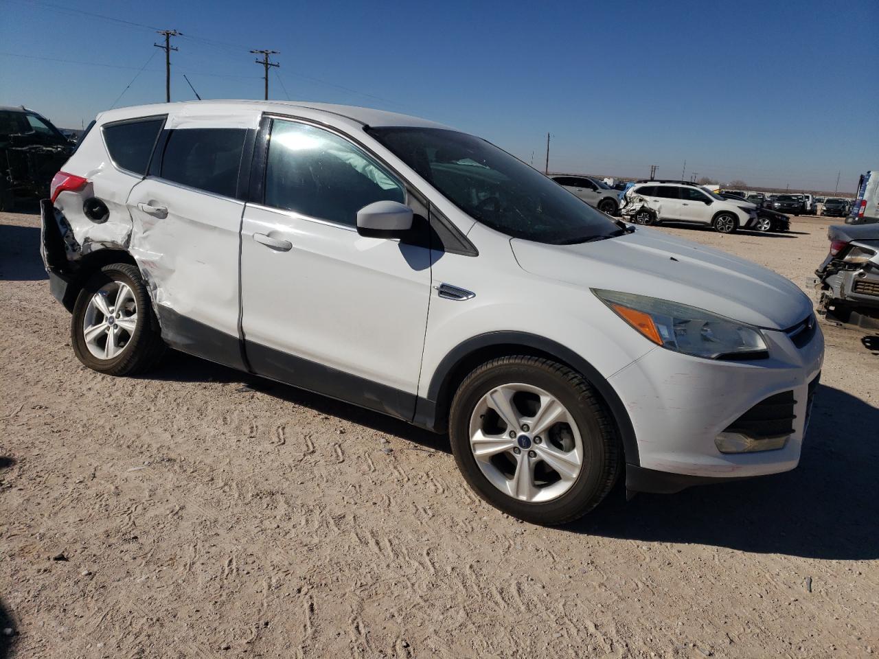 2015 Ford Escape VIN 1FMCU0GX0FUC04265 Copart auction photo, side damage thumbnail 4