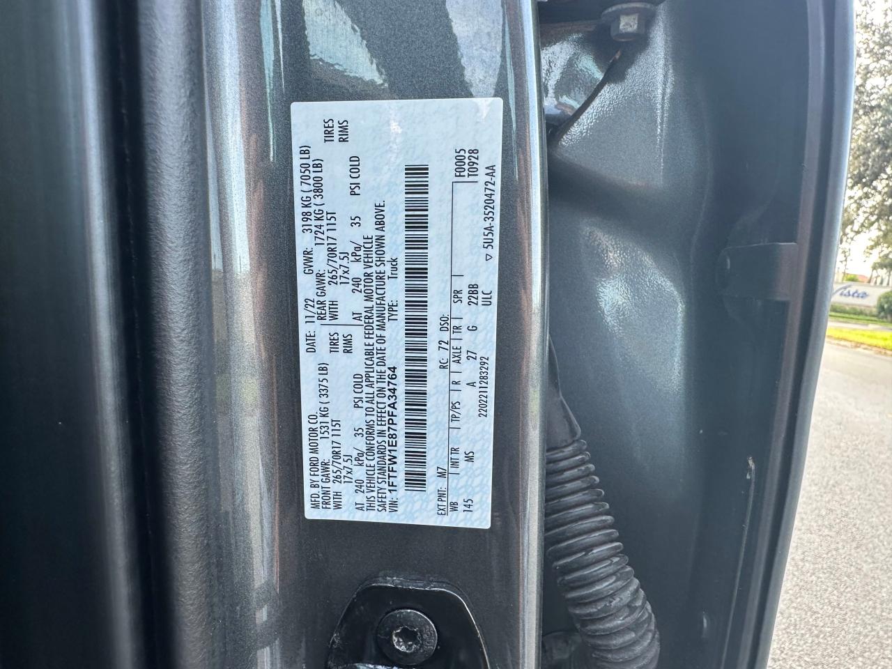 2023 Ford F-150 VIN 1FTFW1E87PFA34764 Copart auction photo, normal wear / damage history damage thumbnail 10