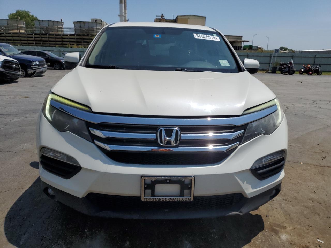 2016 Honda Pilot VIN 5FNYF6H57GB043847 Copart auction photo, undercarriage / front end damage thumbnail 5