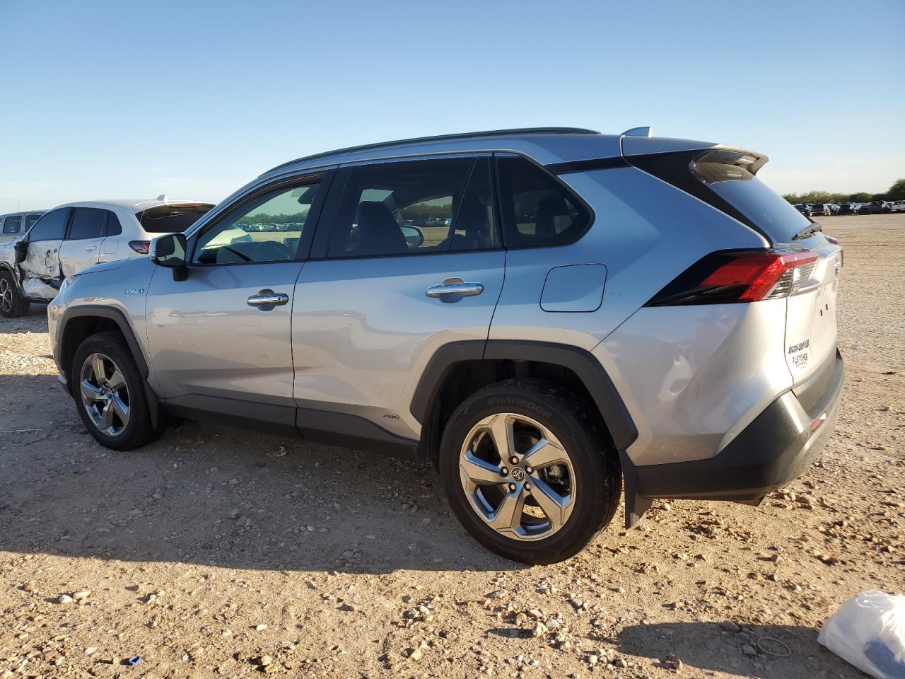 2019 Toyota RAV 4 VIN JTMDWRFVXKD512352 Copart auction photo, side damage thumbnail 2