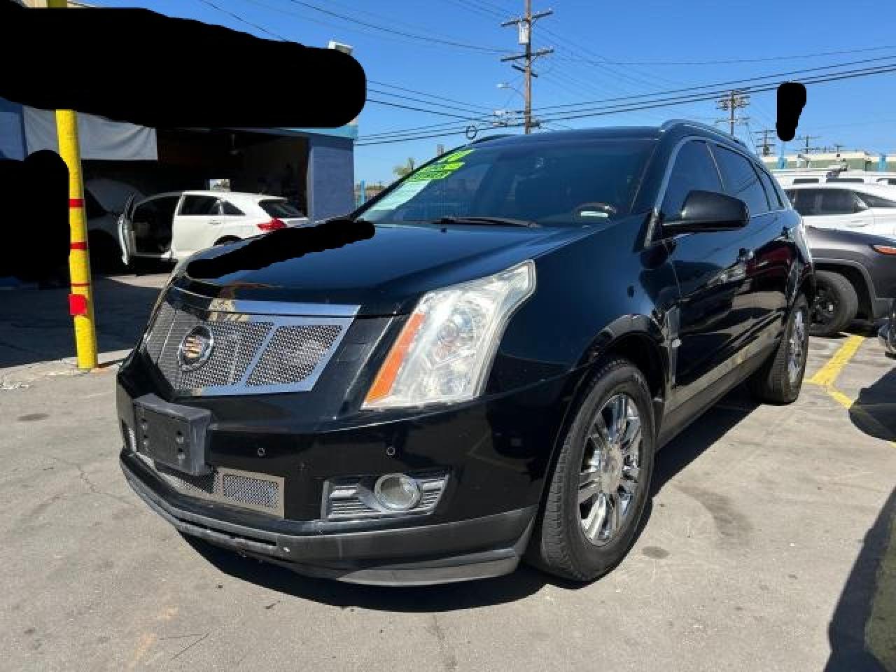 2010 Cadillac SRX VIN 3GYFNKE44AS639179 Copart auction photo, minor dent/scratches / normal wear damage thumbnail 2