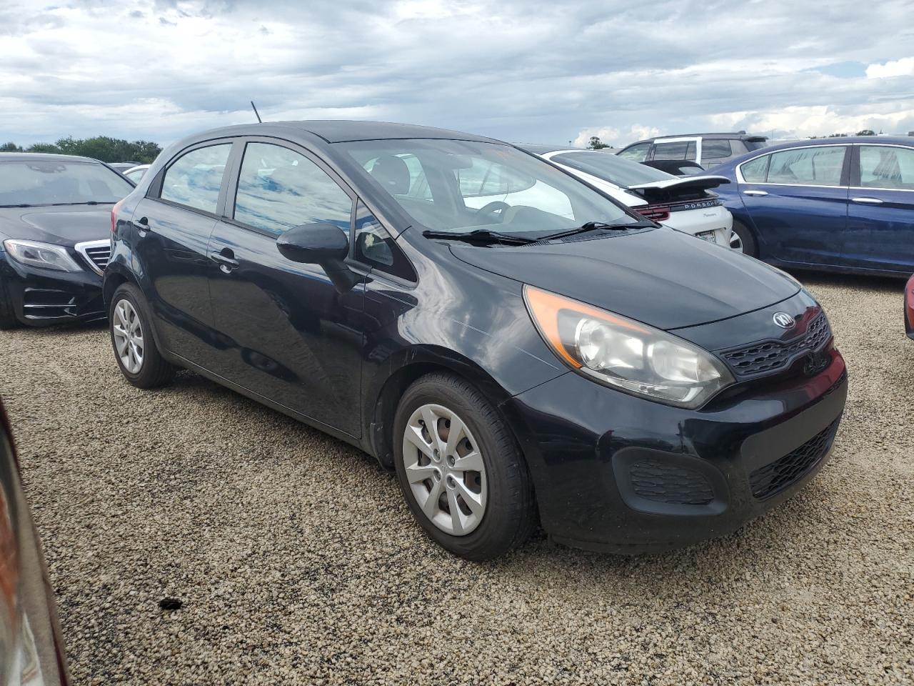 2015 KIA Rio VIN KNADM5A39F6516467 Copart auction photo, water/flood damage thumbnail 4
