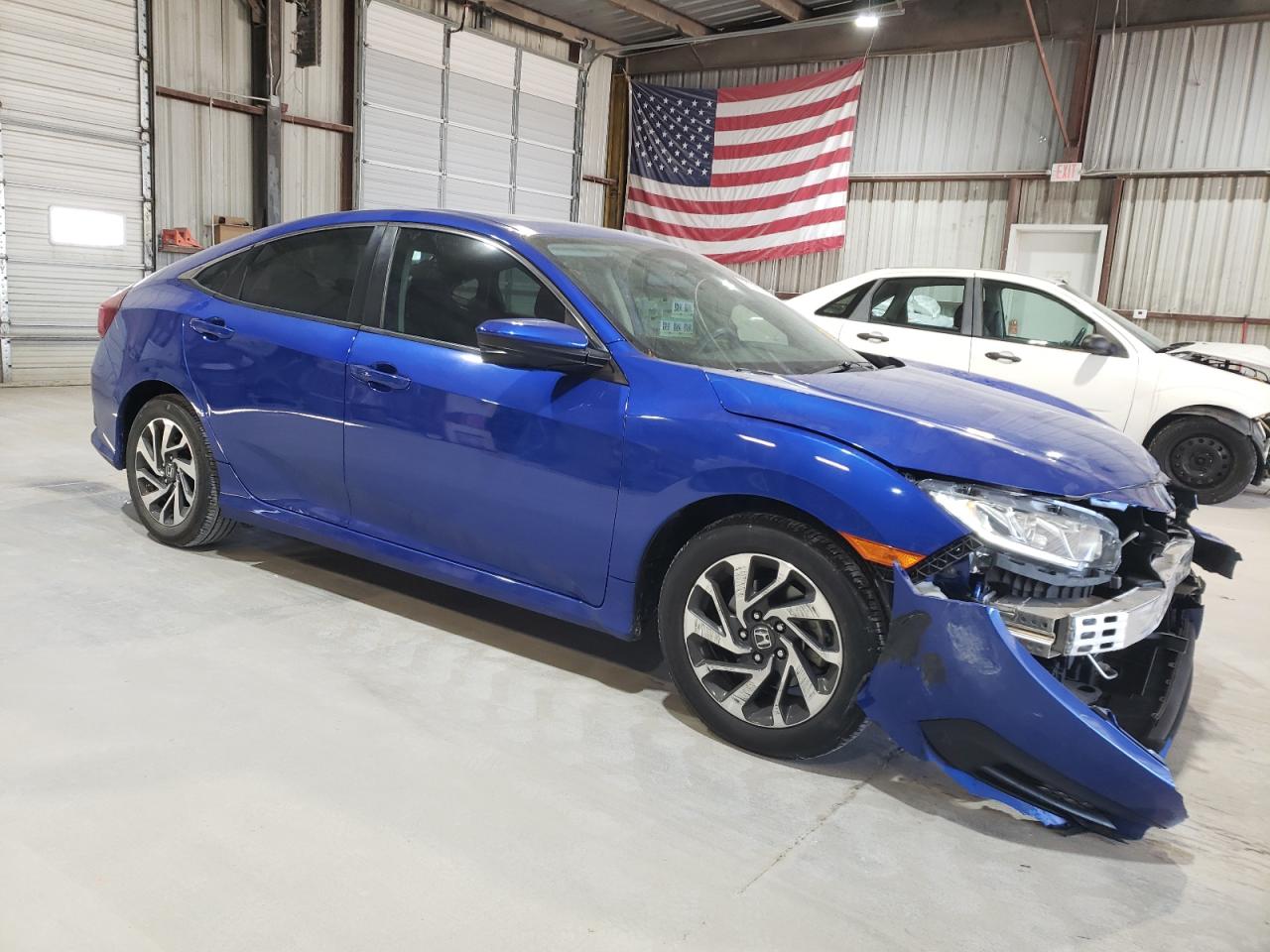 2018 Honda Civic VIN 19XFC2F79JE022962 Copart auction photo, front end / minor dent/scratches damage thumbnail 4
