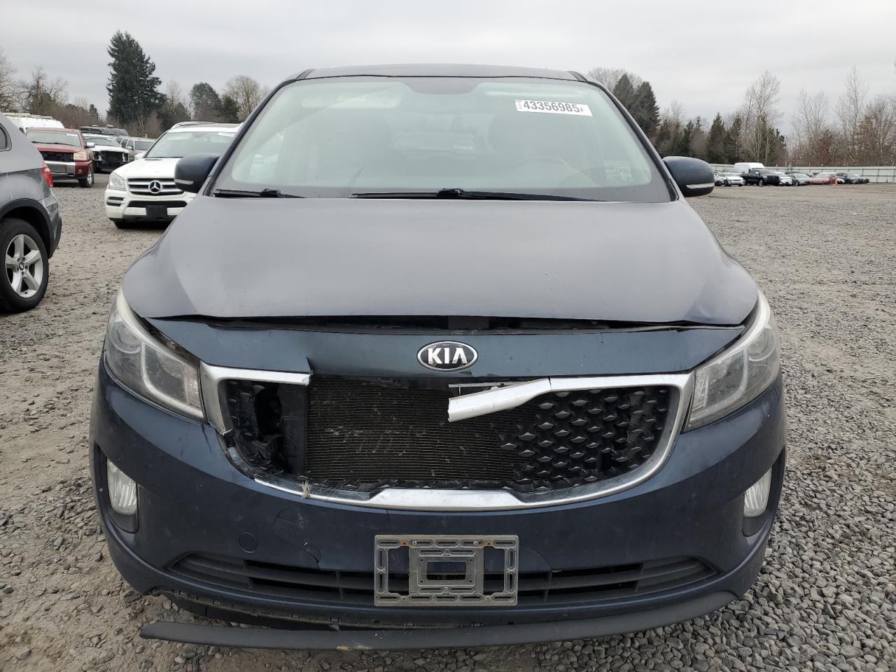 2016 KIA Sedona VIN KNDMC5C10G6147873 Copart auction photo, front end damage thumbnail 5