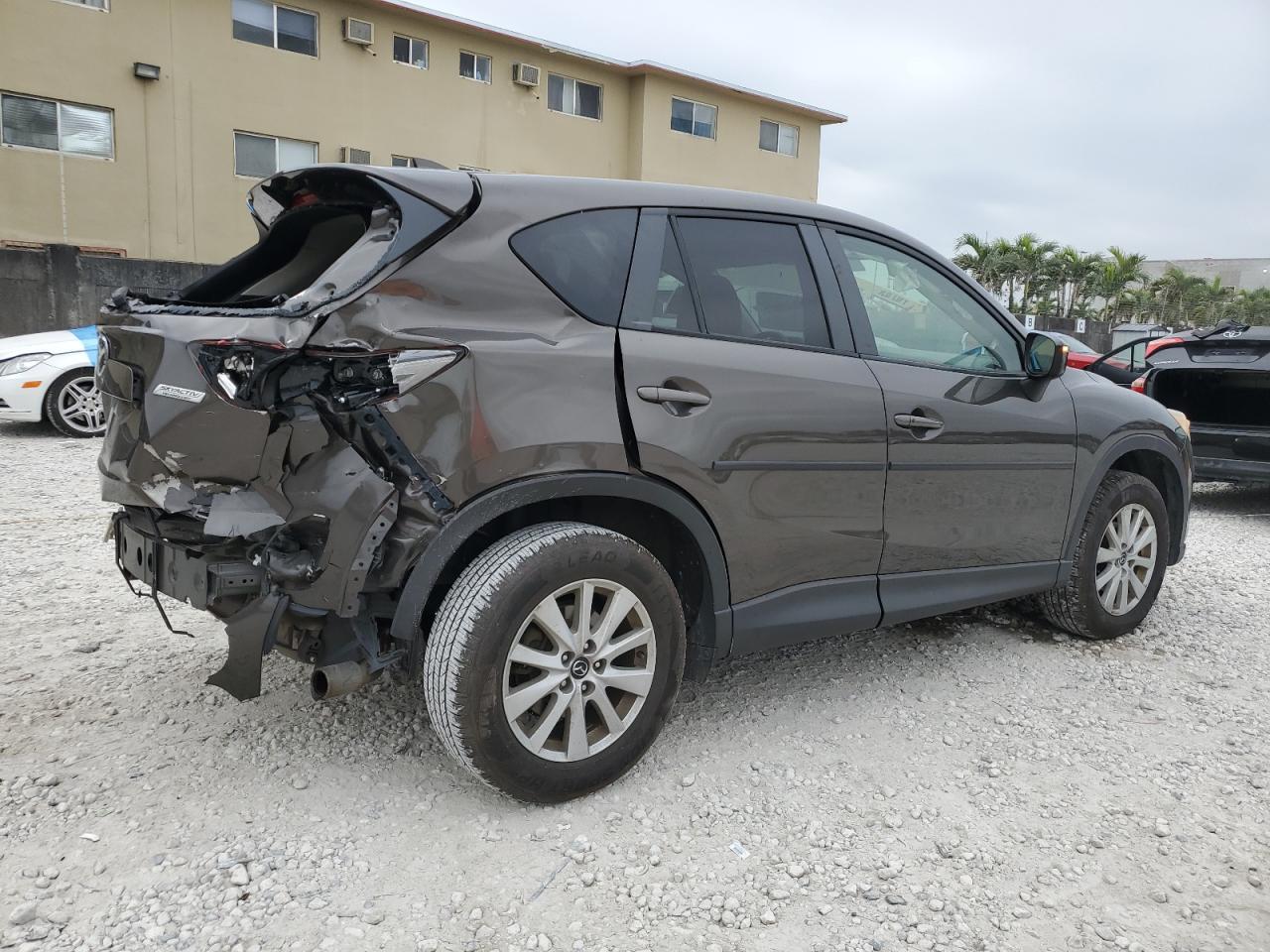 2016 Mazda CX-5 VIN JM3KE4CY2G0812601 Copart auction photo, rear end damage thumbnail 3