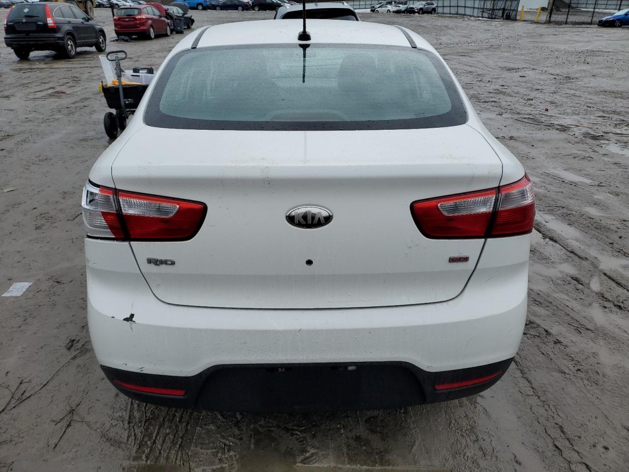 2013 KIA Rio VIN KNADM4A34D6204256 Copart auction photo, side / rear end damage thumbnail 6