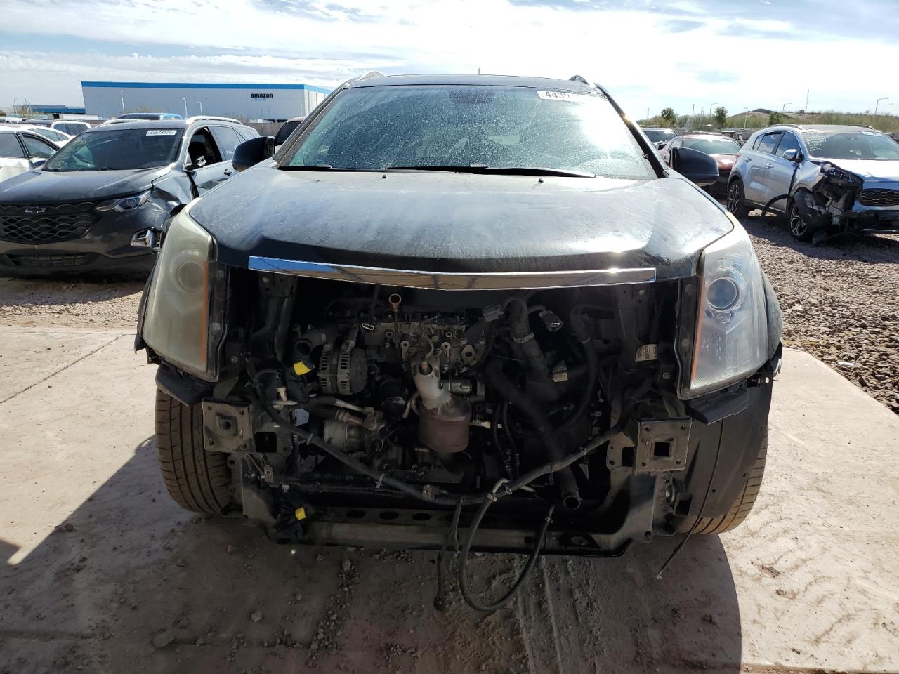 2012 Cadillac SRX VIN 3GYFNBE33CS599056 Copart auction photo, front end damage thumbnail 5