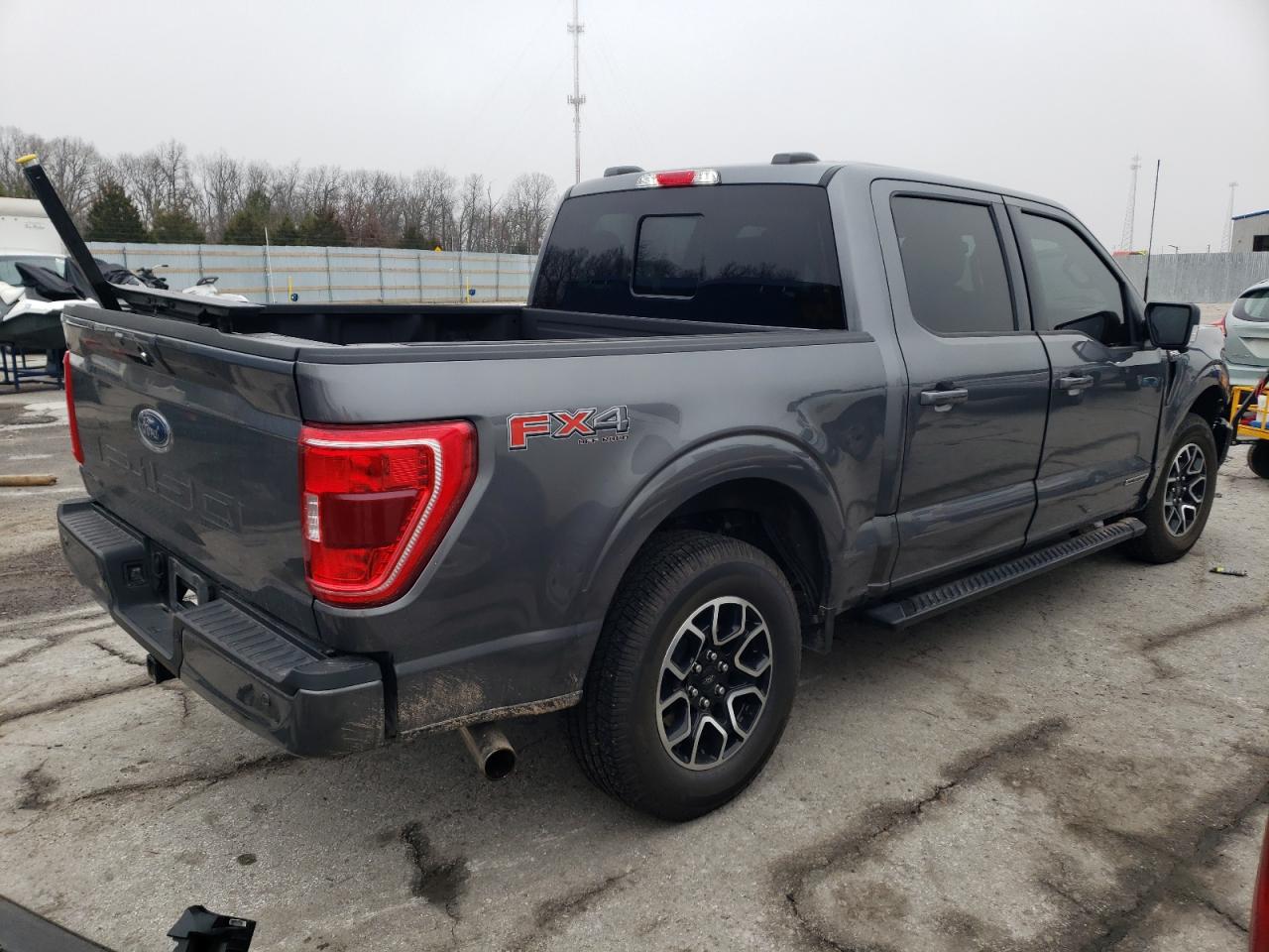 2023 Ford F-150 VIN 1FTFW1ED0PFB31138 Copart auction photo, front end / hail damage thumbnail 3