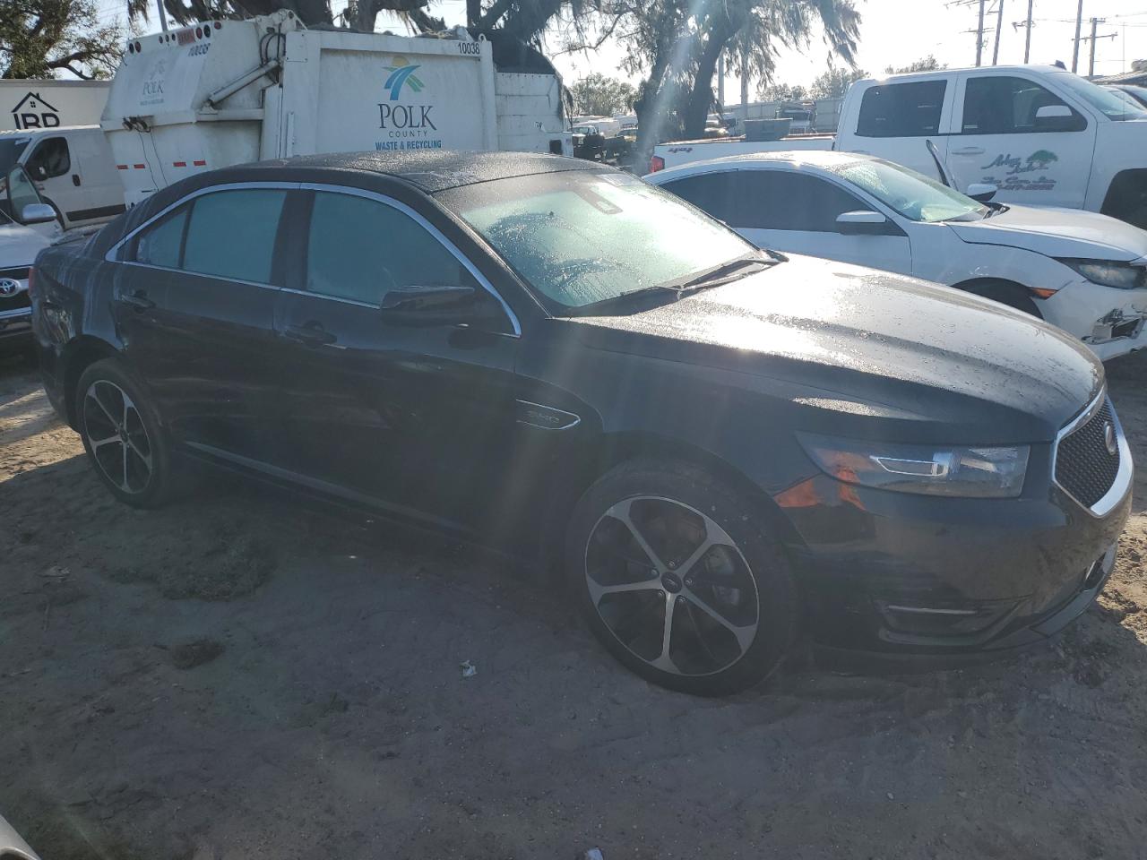 2015 Ford Taurus VIN 1FAHP2KT0FG193970 Copart auction photo, water/flood damage thumbnail 4