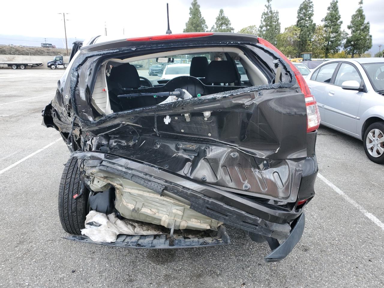 2015 Honda CR-V VIN 2HKRM3H53FH553993 Copart auction photo, side / rear end damage thumbnail 6