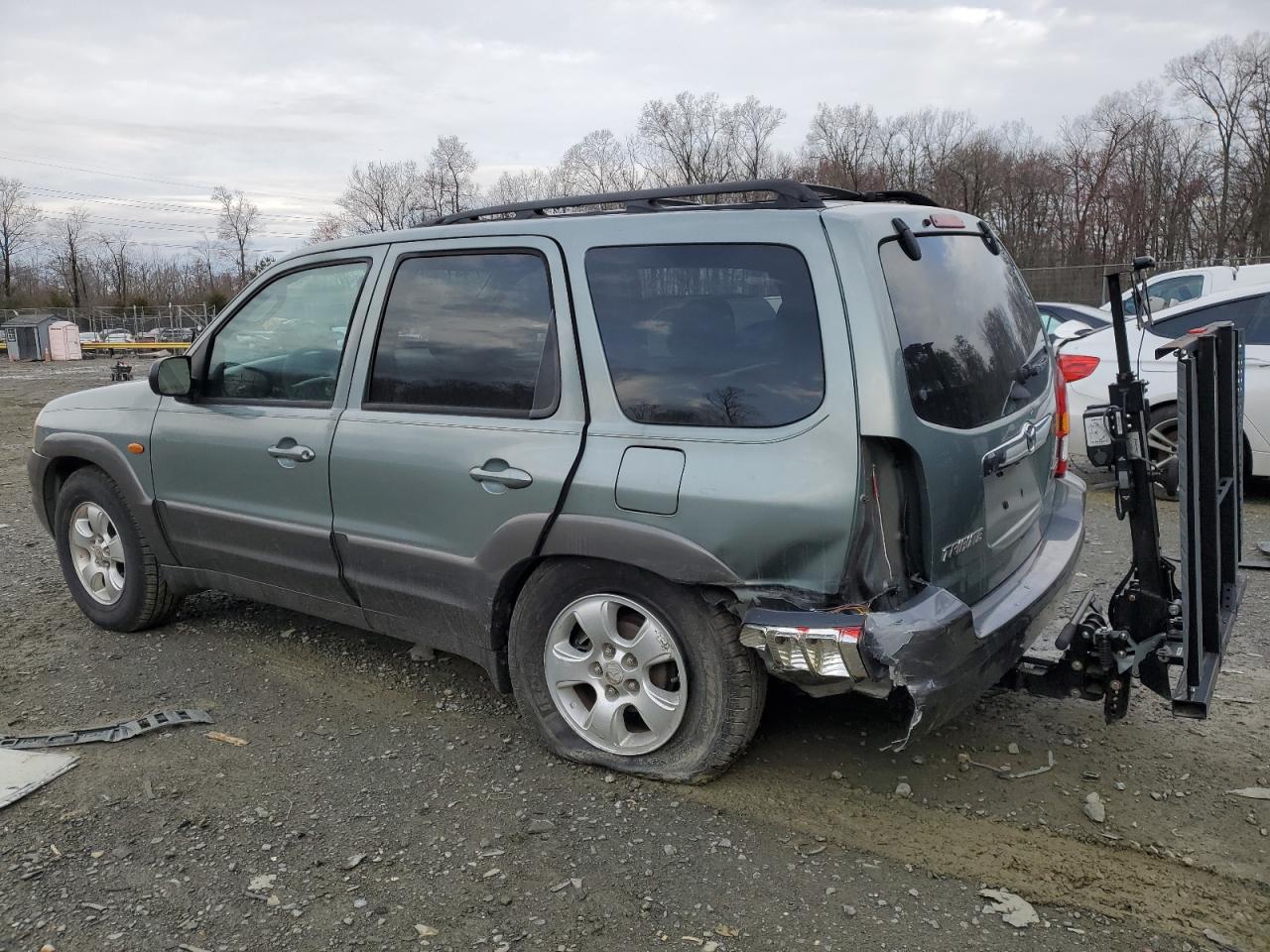2004 Mazda Tribute VIN 4F2CZ96134KM15248 Copart auction photo, rear end / undercarriage damage thumbnail 2