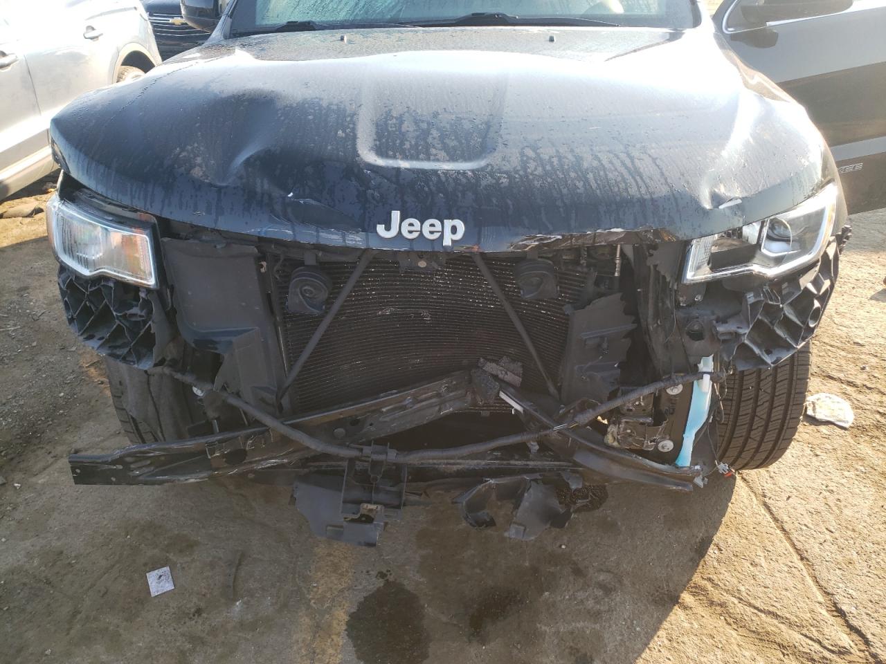 2019 Jeep Grand Cherokee VIN 1C4RJFAG7KC660329 Copart auction photo, front end damage thumbnail 11