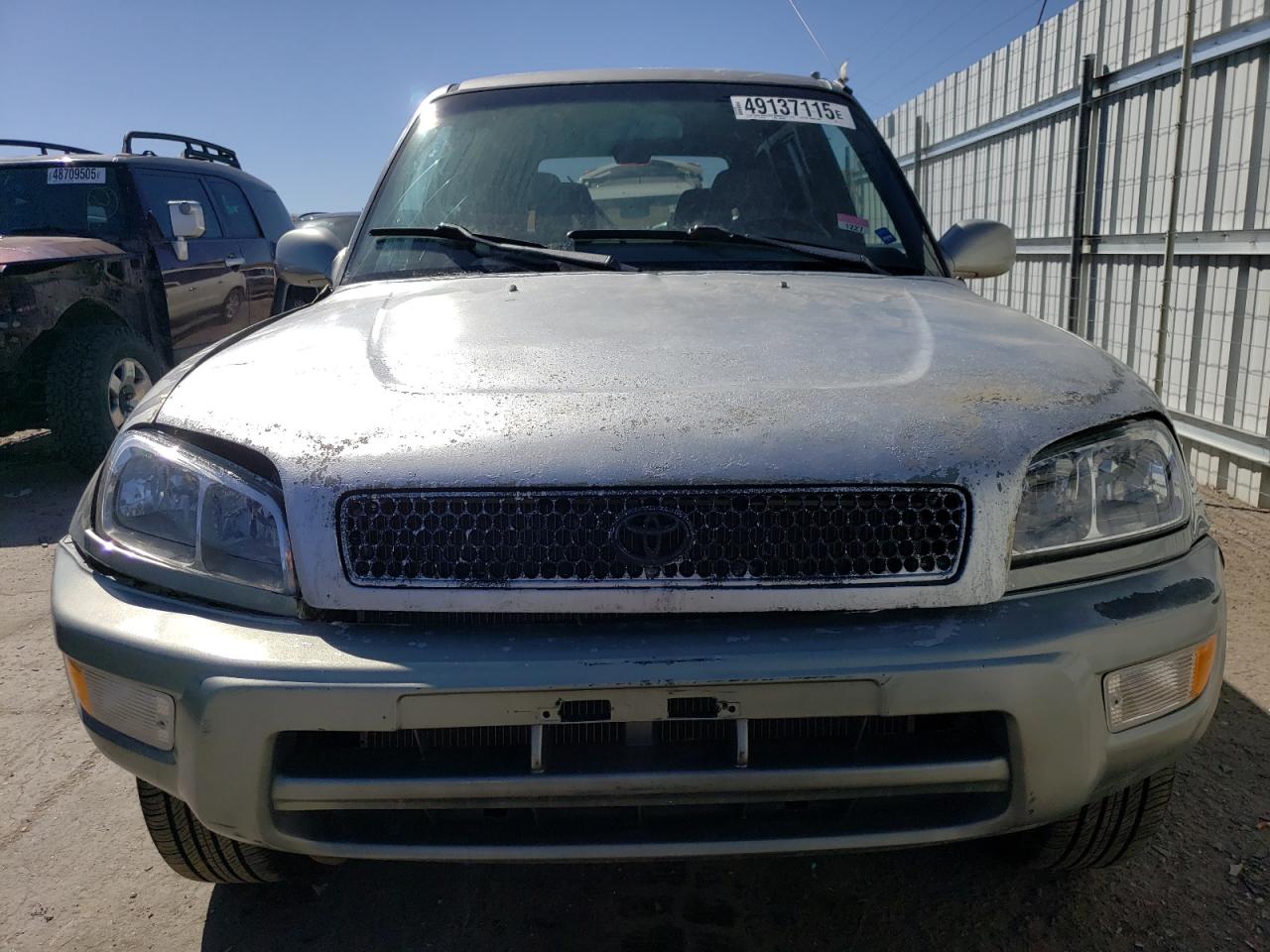 2000 Toyota RAV 4 VIN JT3HP10V8Y7170999 Copart auction photo, rear end / hail damage thumbnail 5