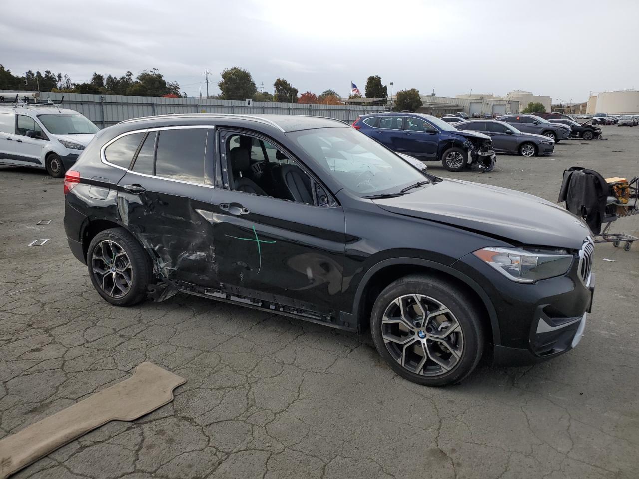 2020 BMW X1 VIN WBXJG7C02L5P30202 Copart auction photo, side damage thumbnail 4