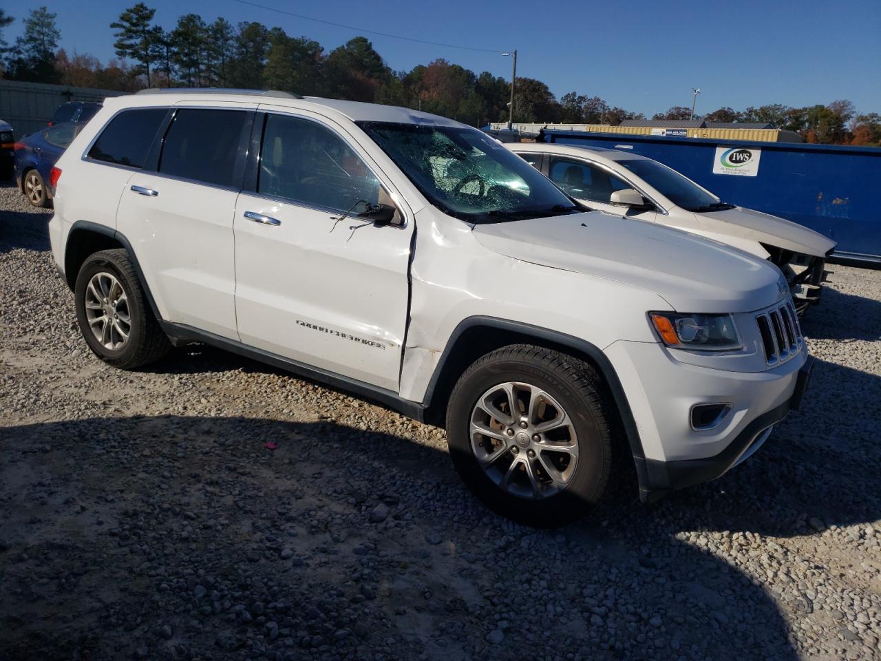 2014 Jeep Grand Cherokee VIN 1C4RJEBG7EC130665 Copart auction photo, side / front end damage thumbnail 4