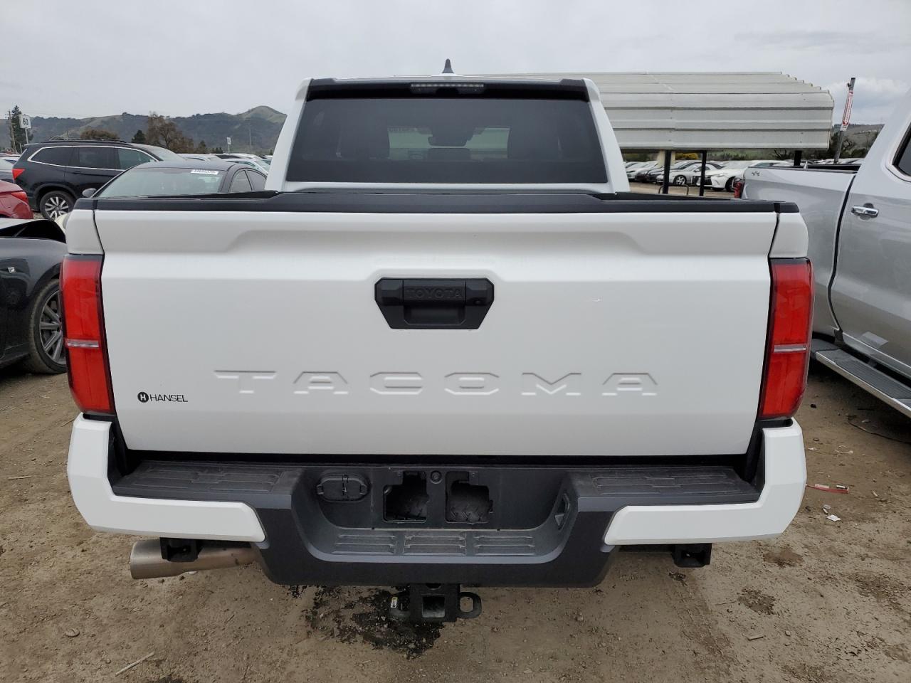 2024 Toyota Tacoma VIN 3TMKB5FN2RM012616 Copart auction photo, vandalism / burn damage thumbnail 6