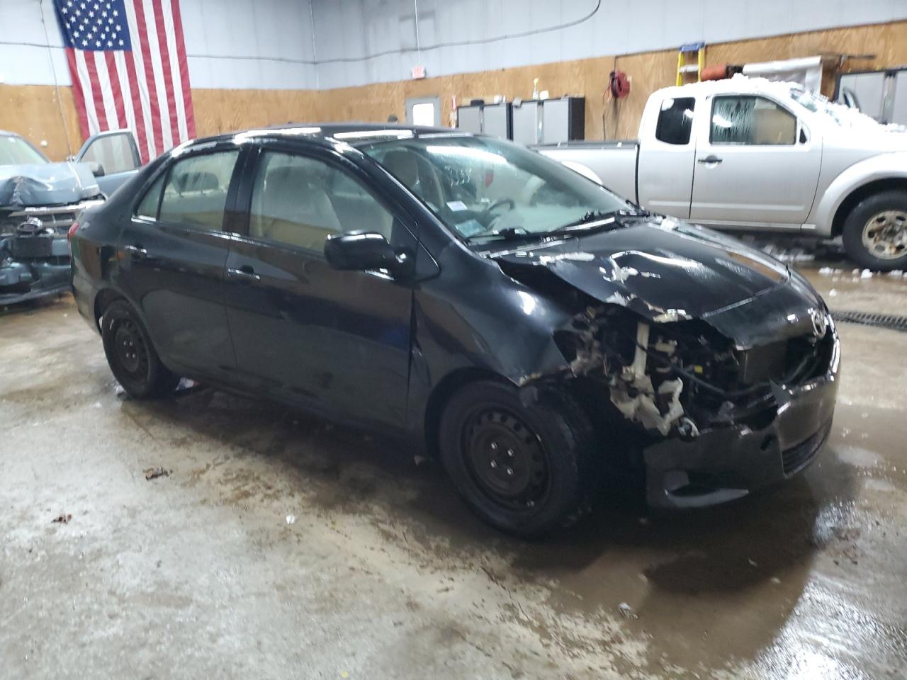 2009 Toyota Yaris VIN JTDBT903791329669 Copart auction photo, front end / minor dent/scratches damage thumbnail 4